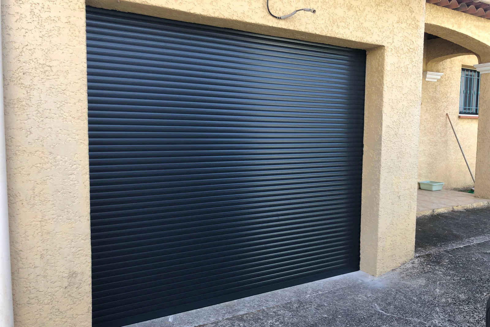 installation porte enroulable