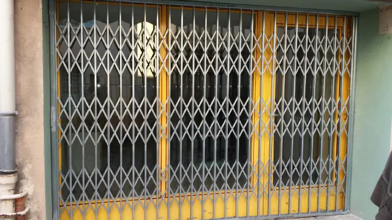 dépannage rideaux métalliques à grille articulée à Reims