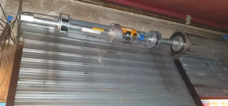 changement moteur rideau metallique paris 5