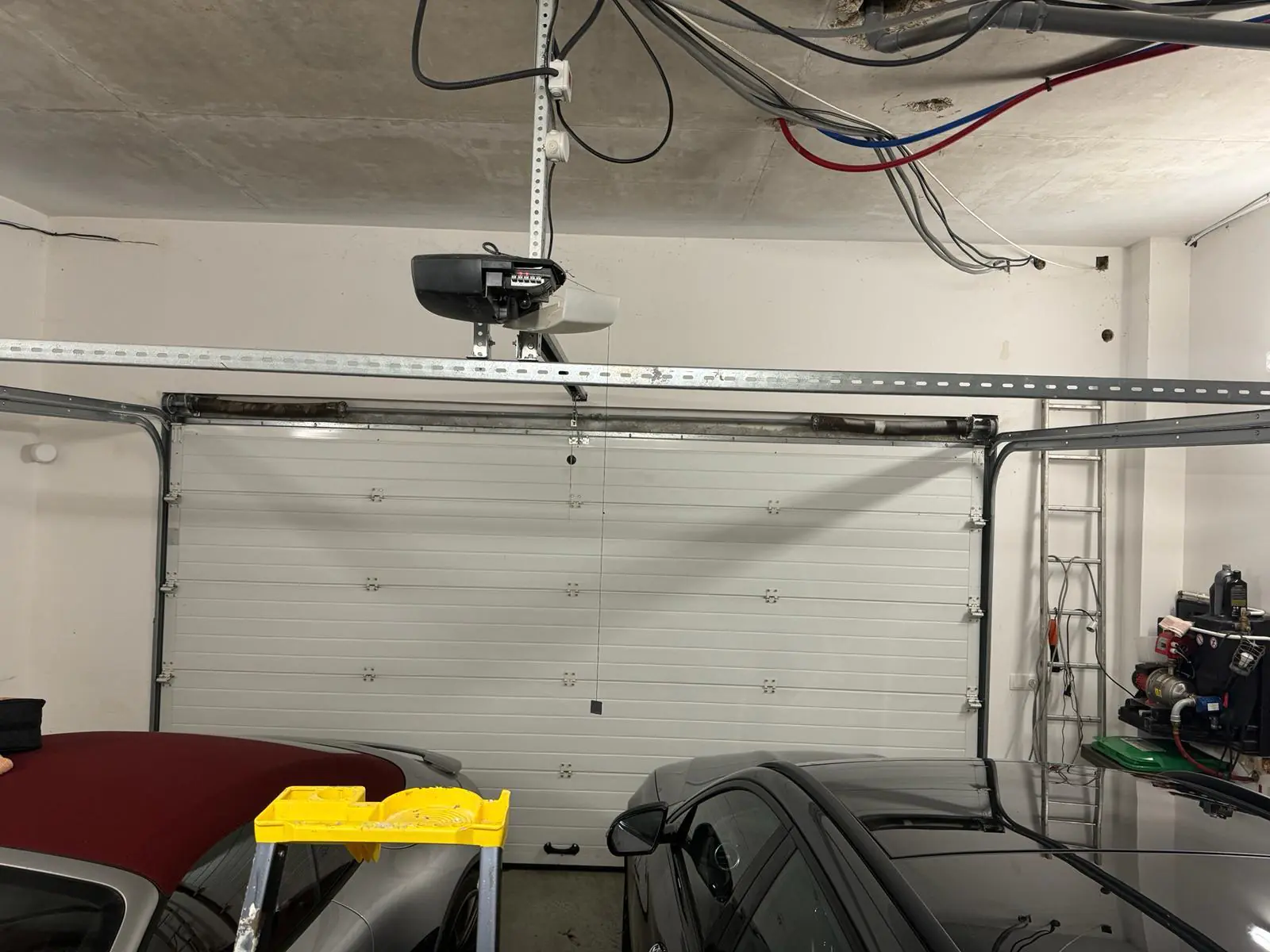 Réparation porte garage sectionnelle à Les Lilas (93260)