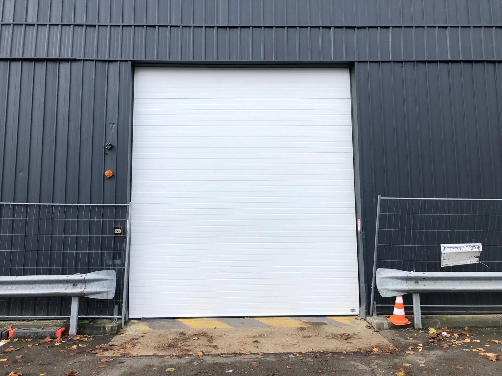 Réparation porte sectionnelle industrielle