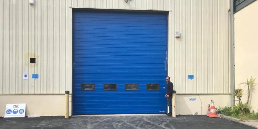 reparation porte sectionnelle industrielle