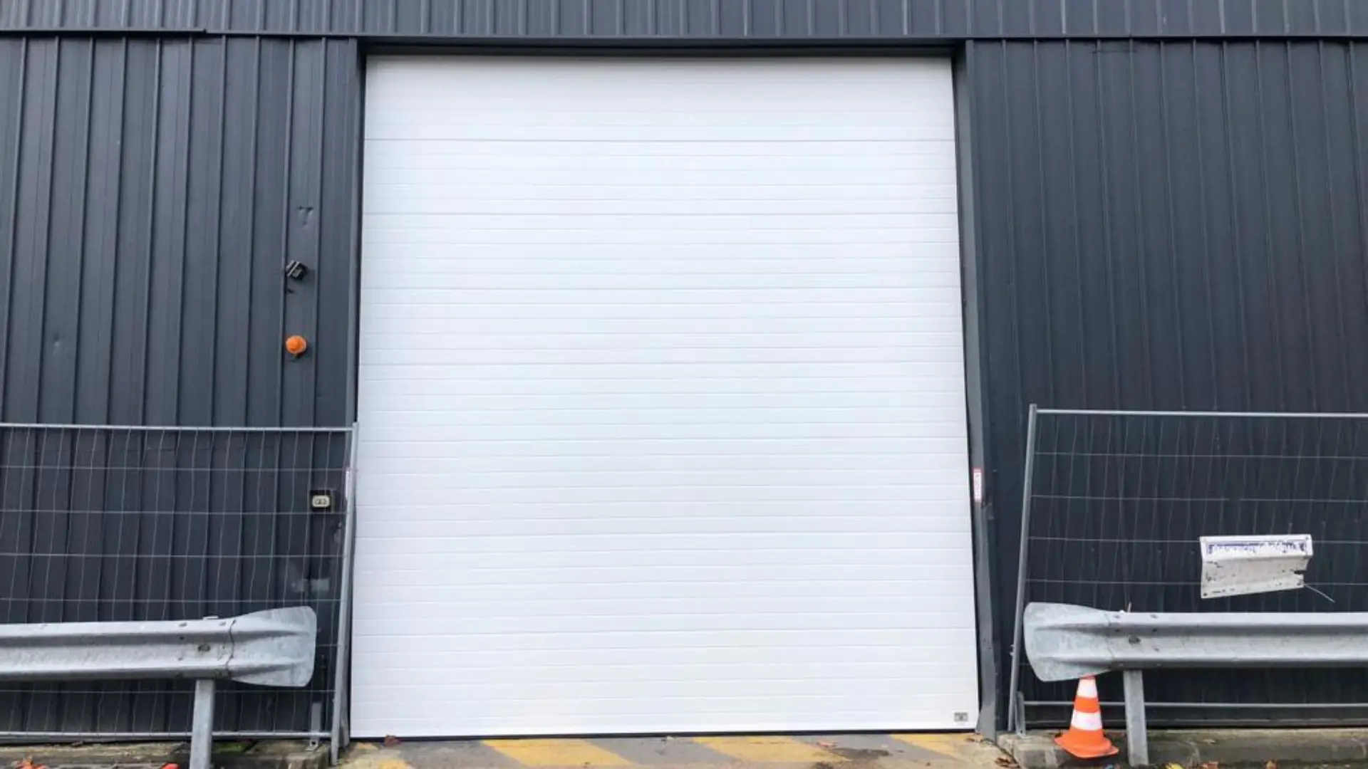 Dépannage de porte sectionnelle industrielle à Grugies