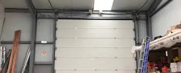 Réparation porte sectionnelle à Albert