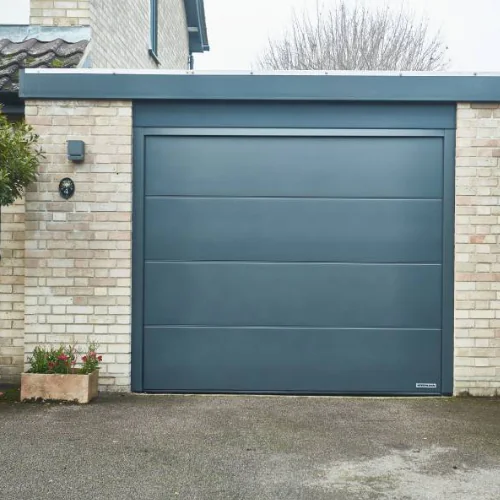 reparation porte garage sectionnelle