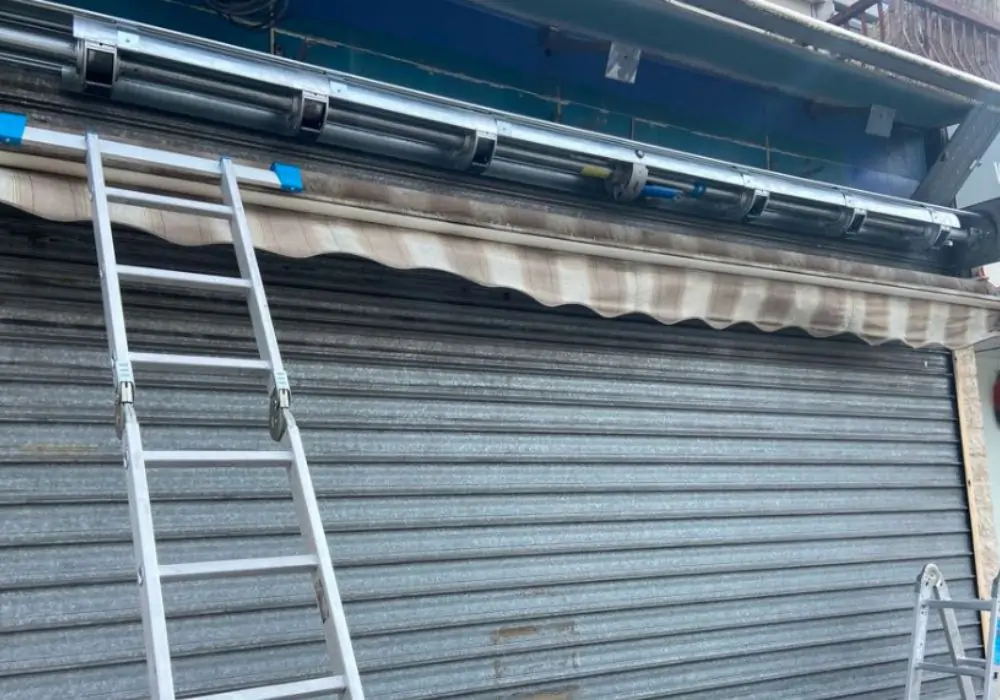 remplacement moteur rideau métallique Le Mesnil Esnard