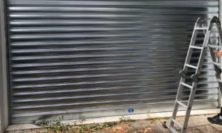 Installation d'un rideau métallique à lames pleines à Chalon-sur-Saône