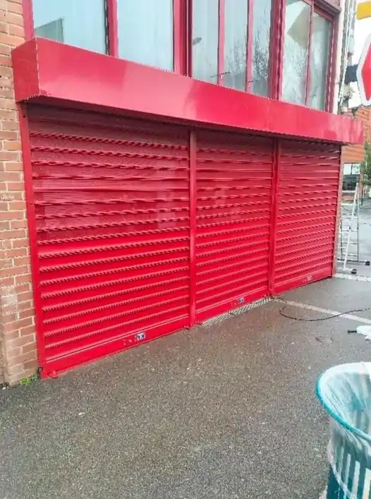 Pose rideau métallique Mons 