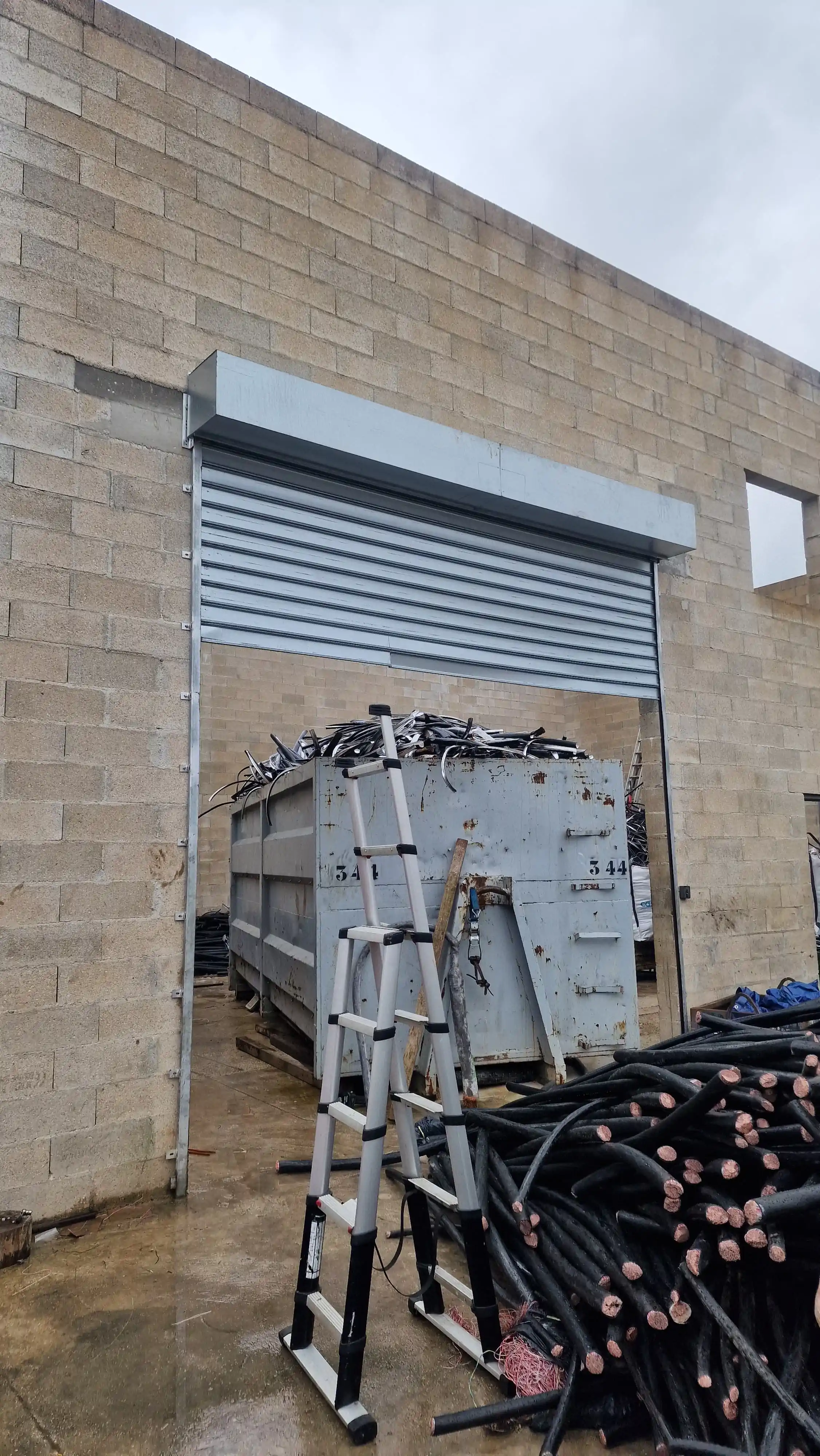 Changement lames rideau métallique Épinal