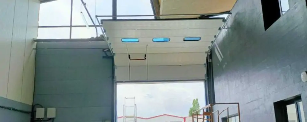 Réparation porte garage sectionnelle Saint Nazaire