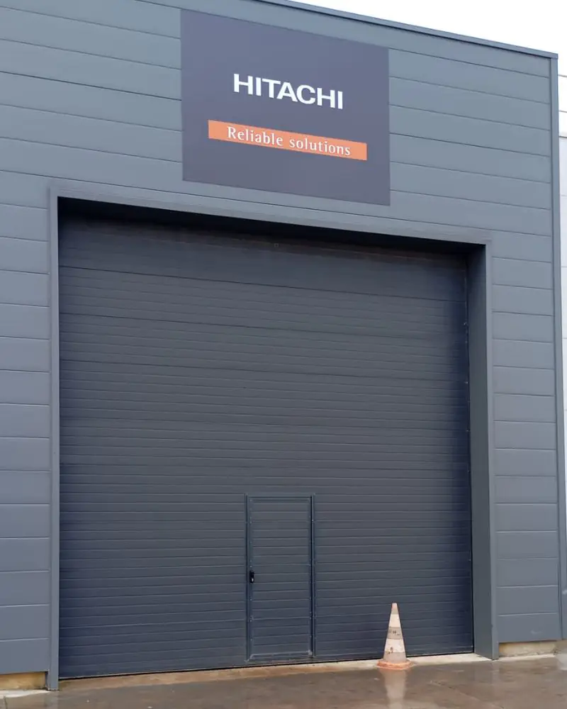 Maintenance porte sectionnelle industrielle Nanterre