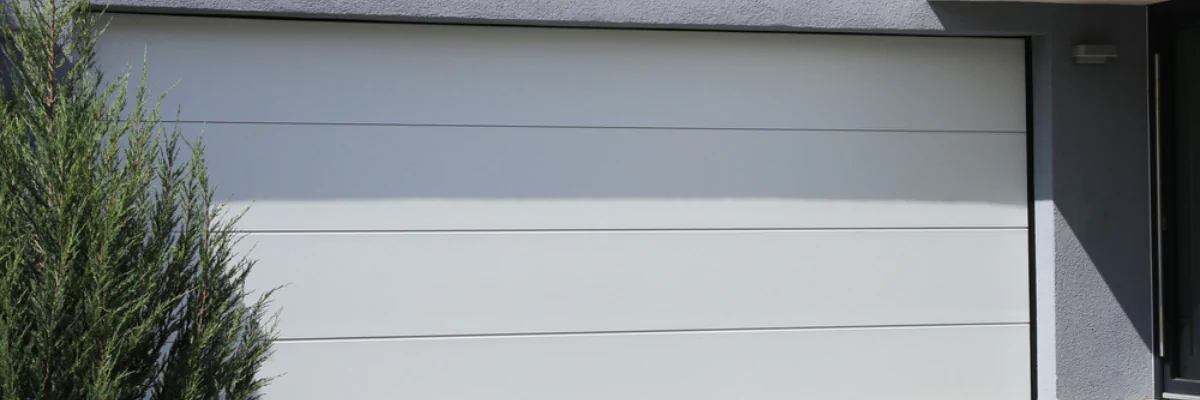 Réparation de portes sectionnelles au Jura par METAL 2000