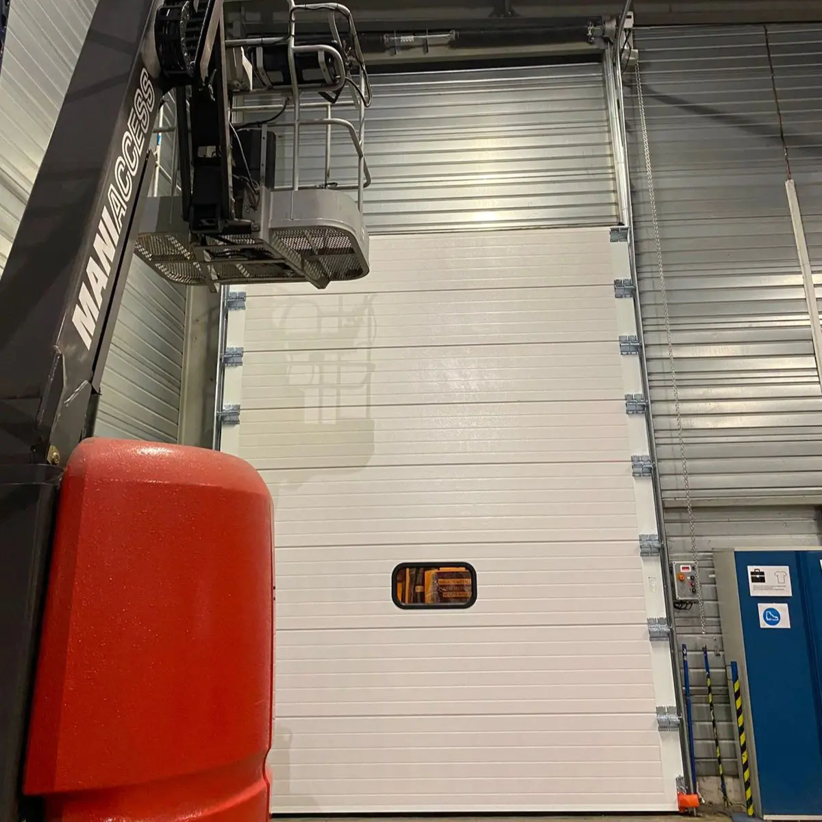 Remplacement panneaux porte industrielle