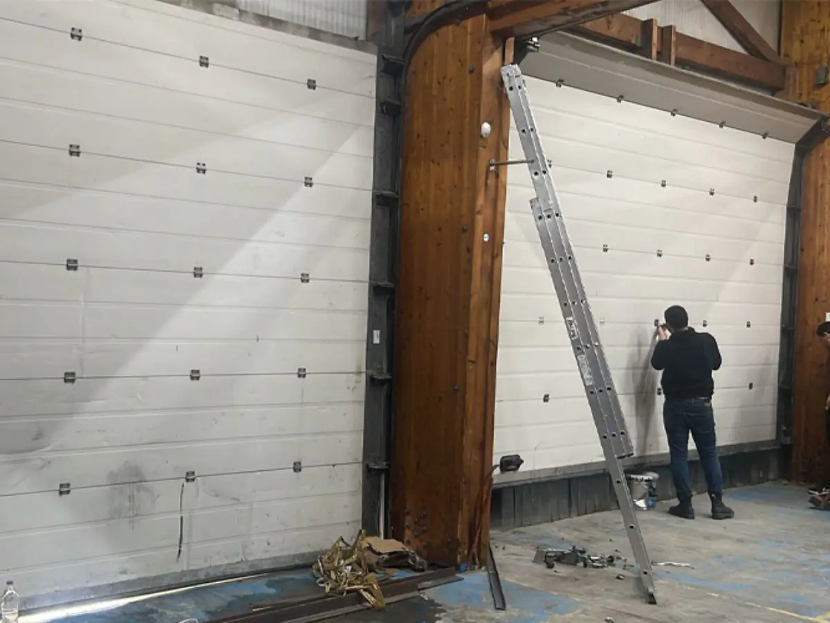 Remplacement panneaux porte industrielle Boulogne Billancourt