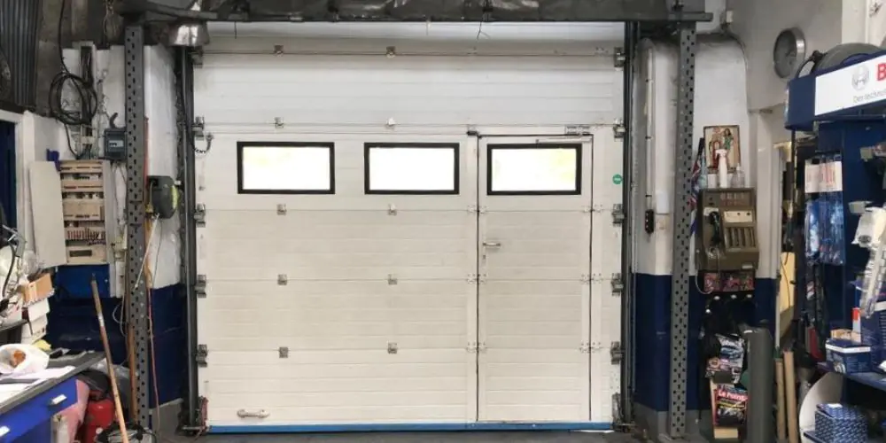 Réparation porte sectionnelle industrielle à Rouen