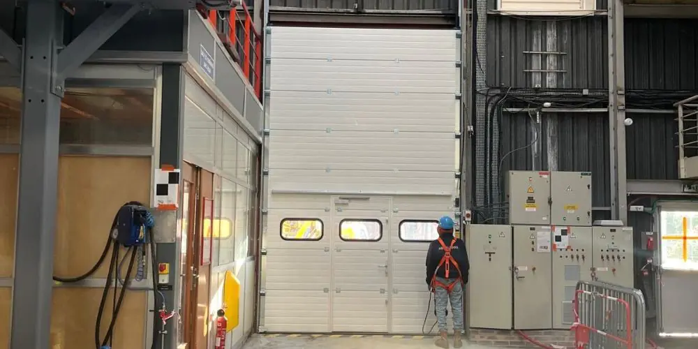 Réparation porte sectionnelle industrielle Colombes