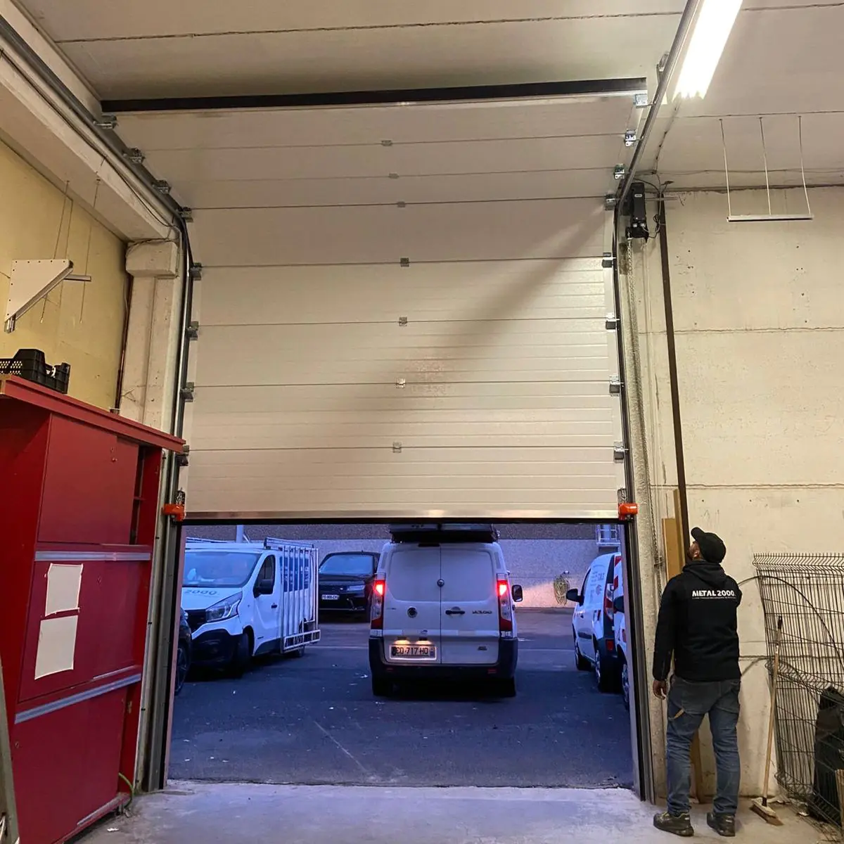 Réparation porte sectionnelle industrielle 91