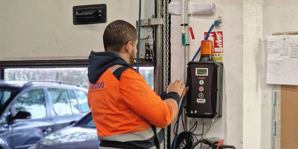 Réparation porte sectionnelle industrielle Rouen