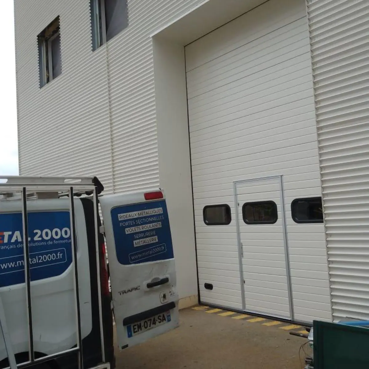 Réparation porte sectionnelle industrielle Rueil Malmaison