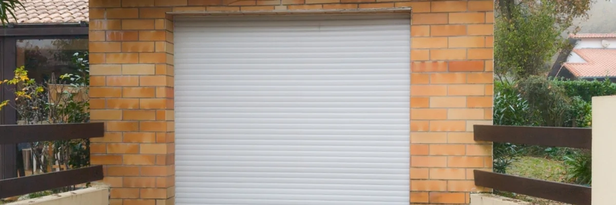 Réparation de portes de garage enroulables au Jura par l'équipe METAL 2000 !