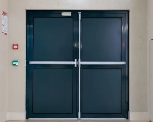 Réparation d'une porte incendie à Thiais par l'équipe METAL 2000