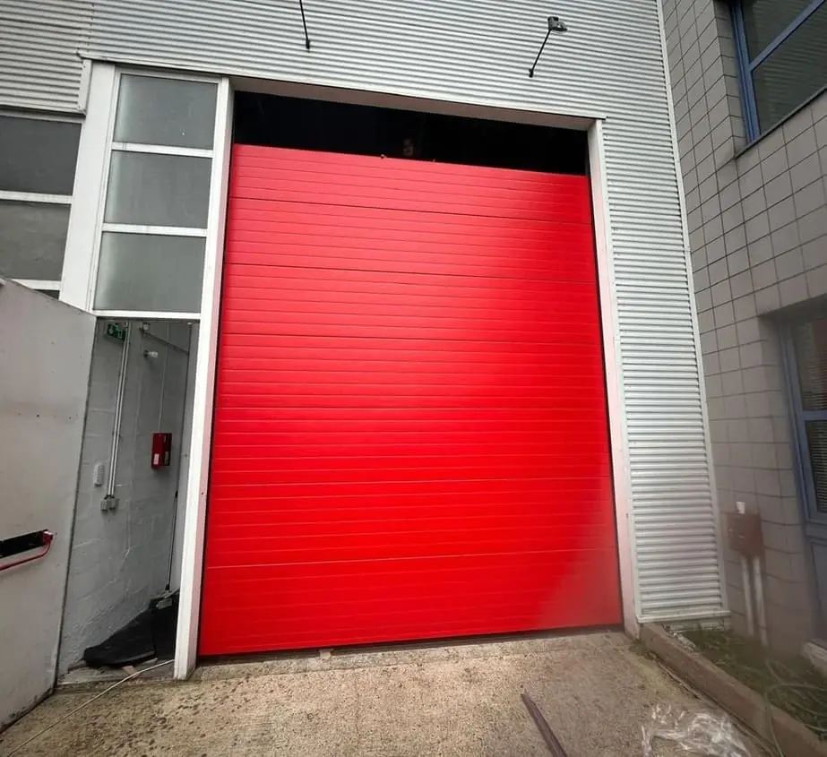 Réparation porte sectionnelle industrielle Aulnay sous Bois