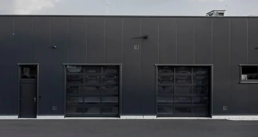 Réparation porte sectionnelle industrielle Sarcelles 
