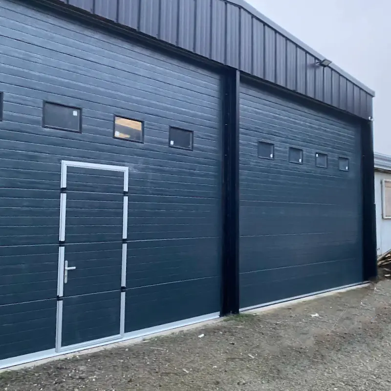 Réparation porte sectionnelle industrielle Outreau