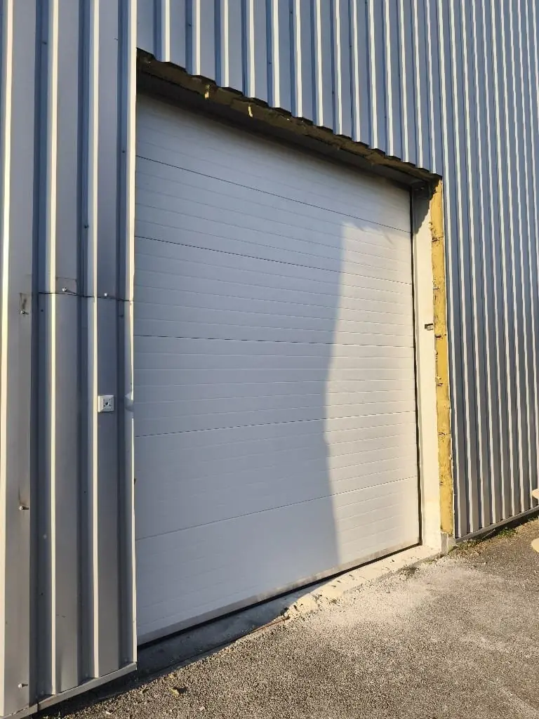 Maintenance porte sectionnelle industrielle Lacroix Saint Ouen 60160 