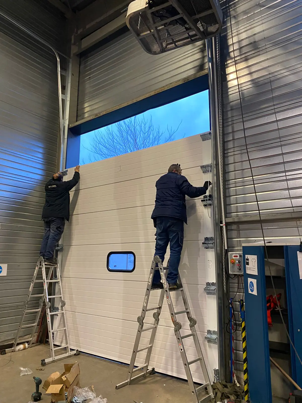 changement porte industrielle Cambrai