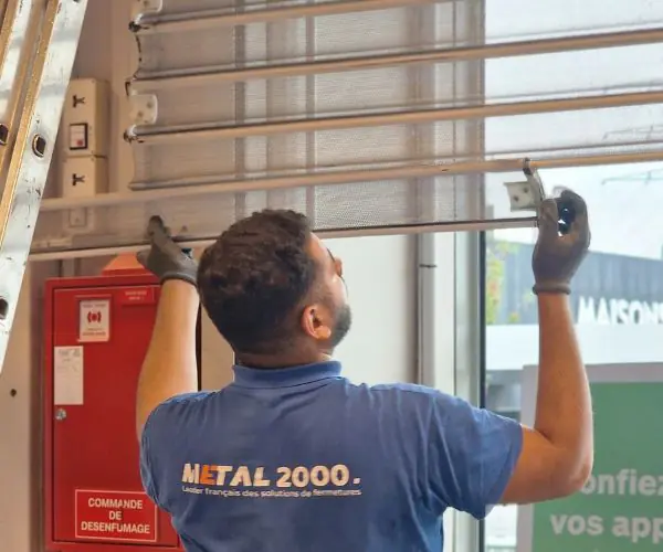 Changement lames rideau metallique -METAL 2000