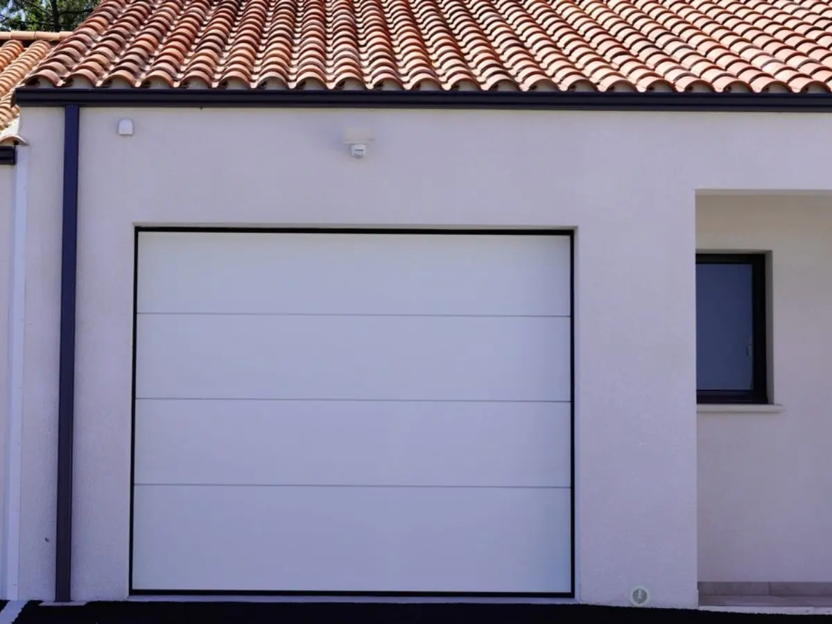 Réparation porte de garage à Val de Reuil