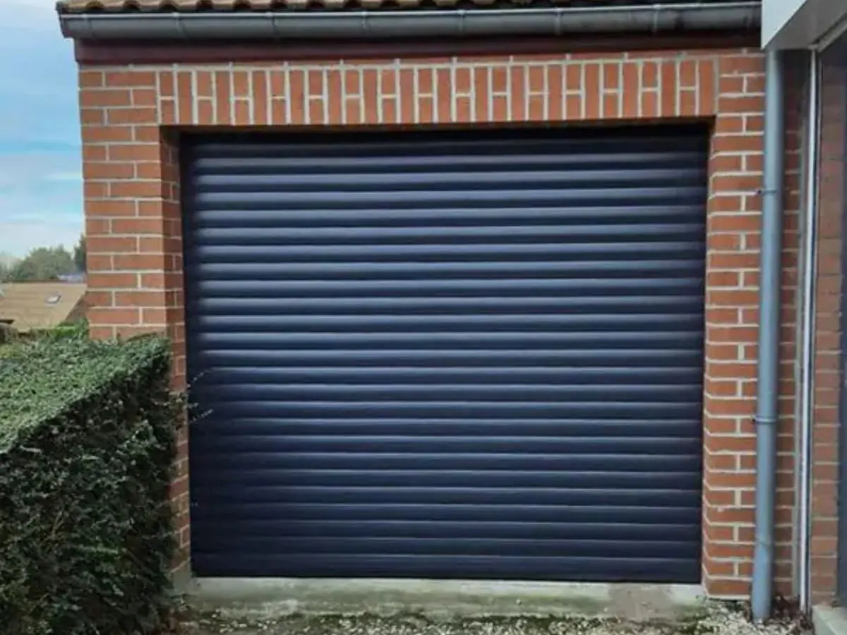 Réparation porte de garage enroulable L'Aigle