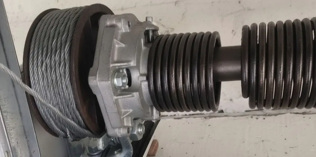 comment règler tension ressorts Novoferm sur portes Iso