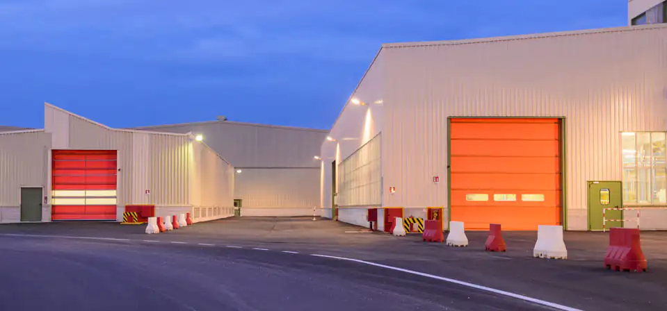 Maintenance préventive de porte industrielle dans un entrepôt à Coudekerque-Branche
