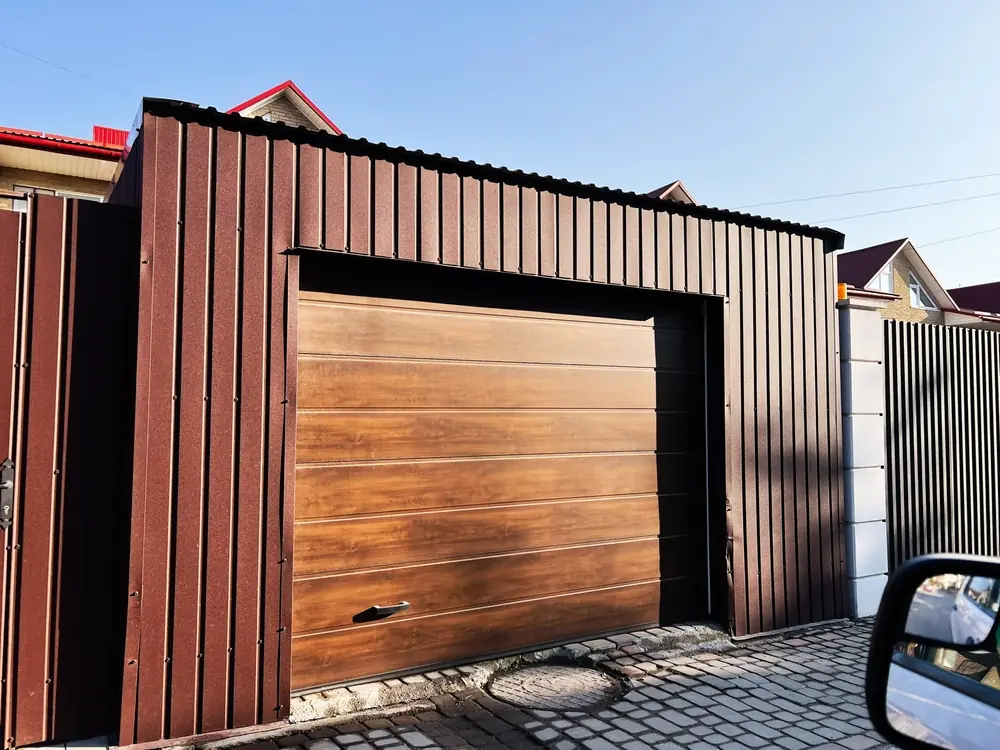 Réparation porte de garage sectionnelle Migennes par l'équipe METAL 2000
