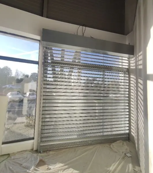 Entretien rideau métallique microperforé Charente