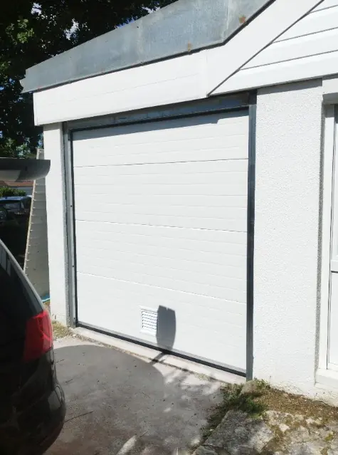 Réparation porte de garage sectionnelle Rillieux-la-Pape