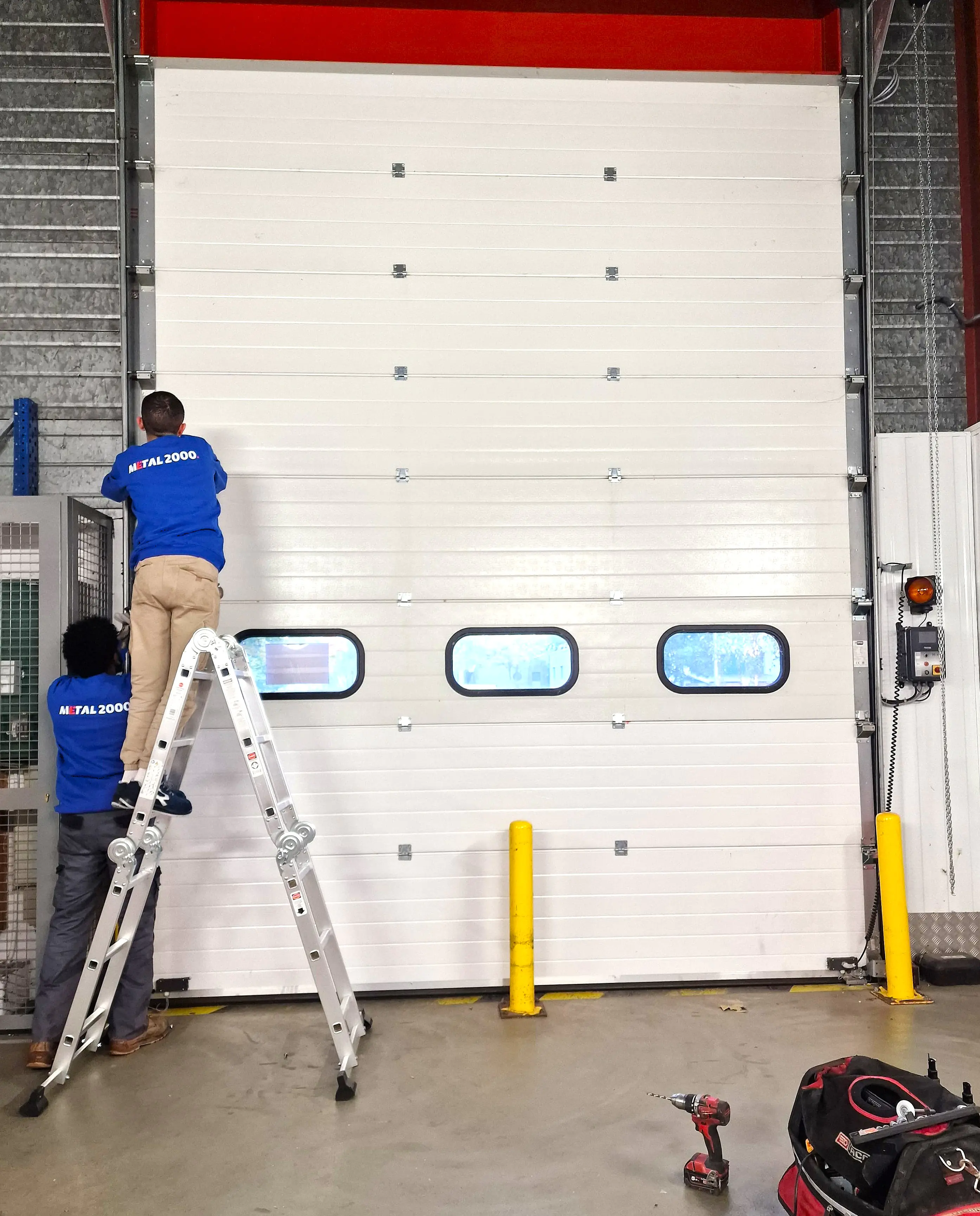 Zoom sur notre service de réparation portes sectionnelles industrielles en 69100