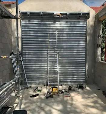 Installation rideau métallique Saint-Denis (93210)