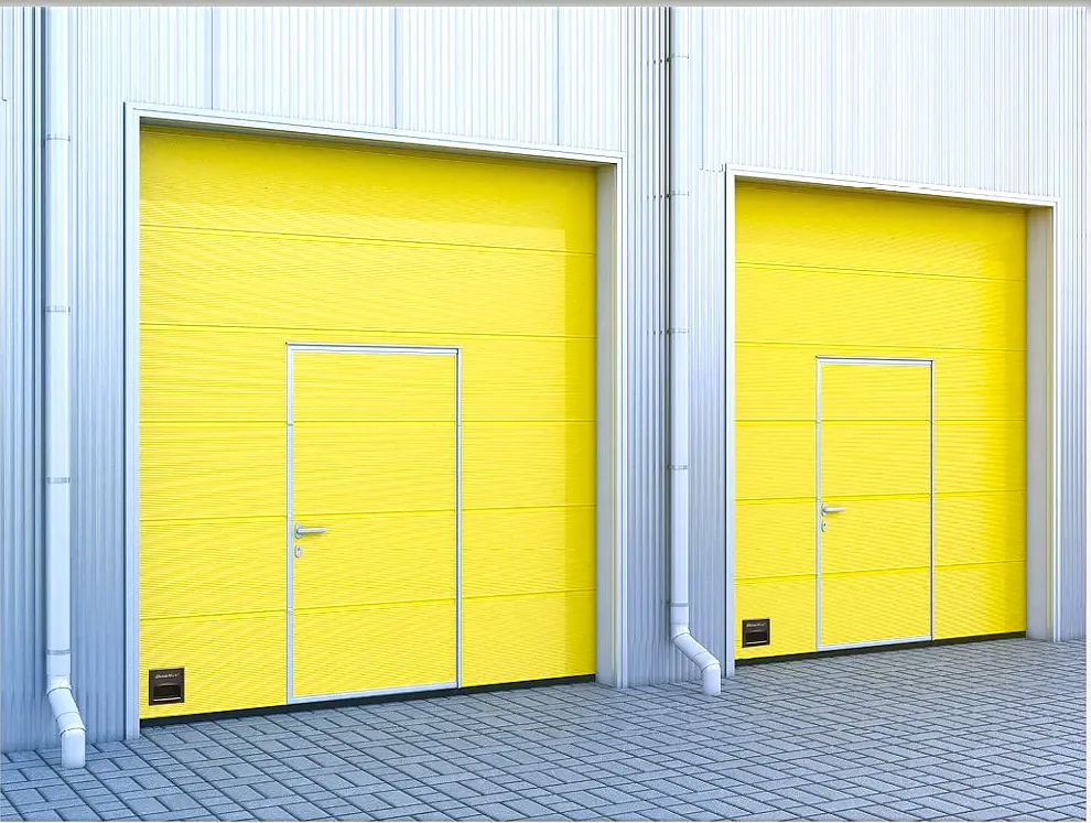 Les avantages d’une porte sectionnelle industrielle avec portillon intégré