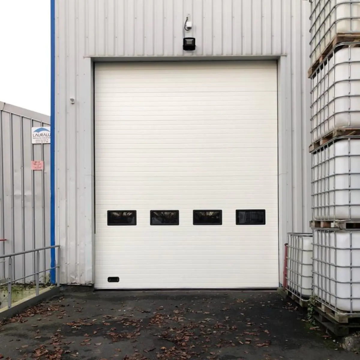 Entretien porte sectionnelle industrielle La Hague