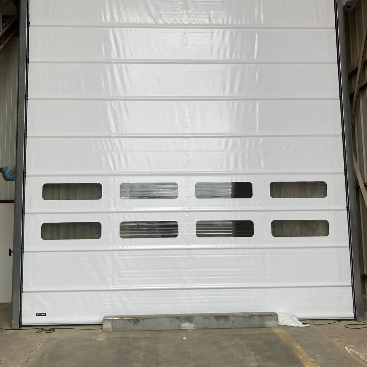 Réparation porte souple rapide à Marly-la-Ville