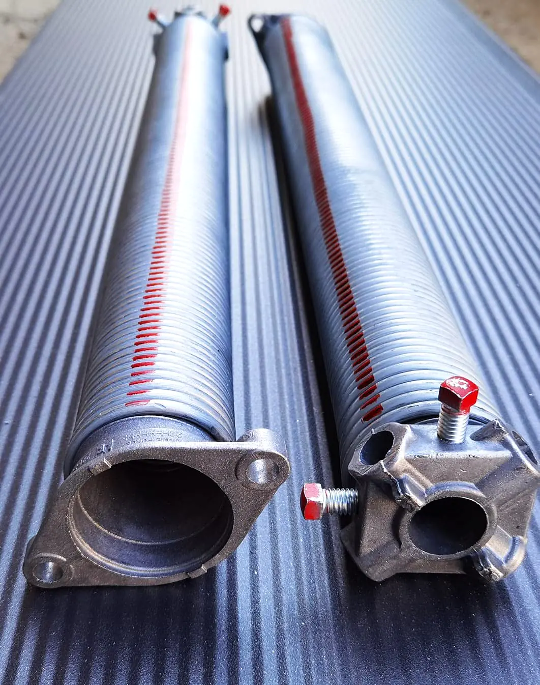 ressort de torsion de porte de garage sectionnelle