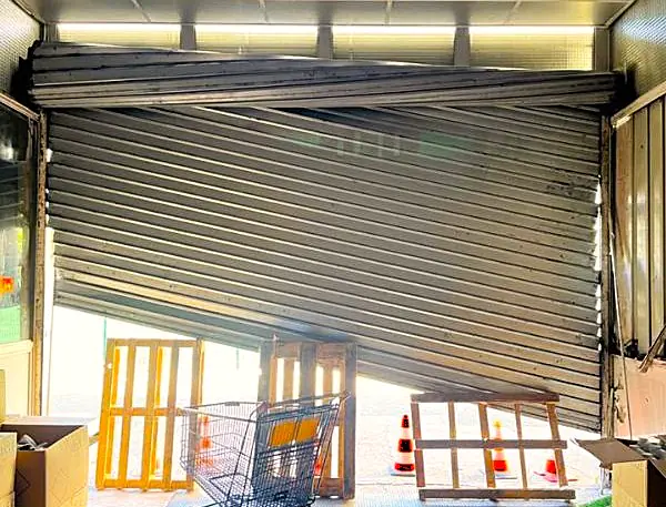 Comment réparer un rideau métallique désaxé, Guide METAL 2000