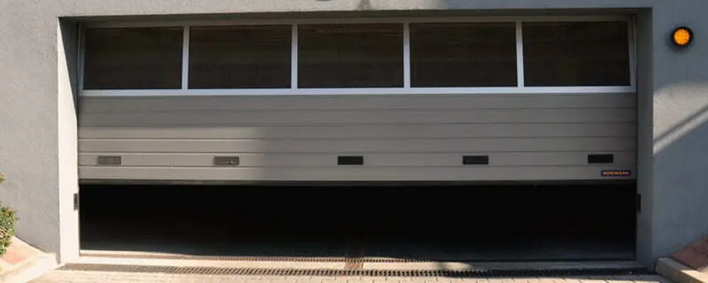 Reparation porte de garage 93240