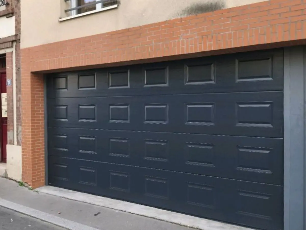 Réparation porte de garage bloquée Bezons