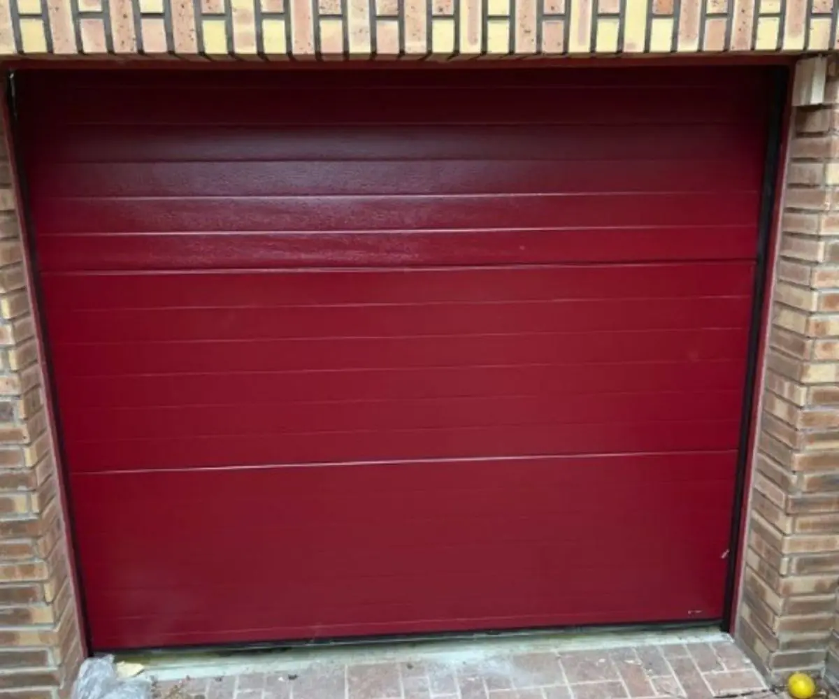 Réparation porte de garage sectionnelle Chelles
