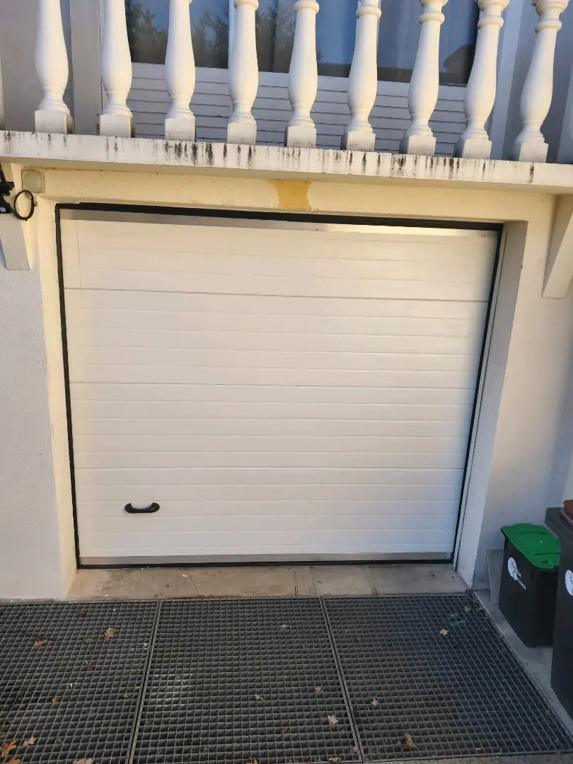 réparation porte de garage sectionnelle Cormeilles-en-Parisis