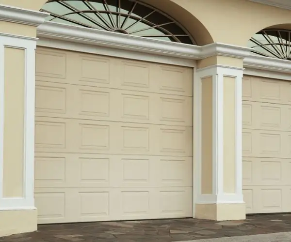 Reparation porte de garage sectionnelle Vaujours 93410